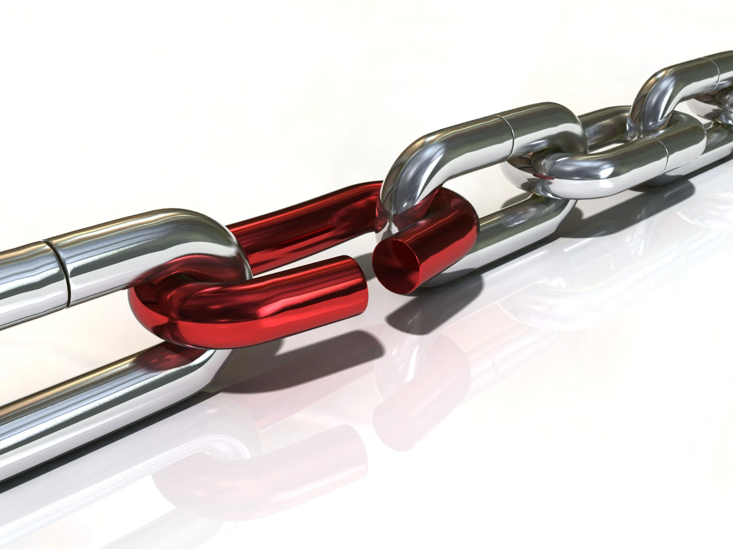 A chrome chain with one red link standing out as the weak link.